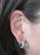 Ein Ohr einer Frau