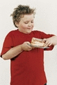 Kind mit dem Kuchen